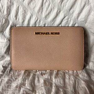 Tan Micheal Kors women’s wallet